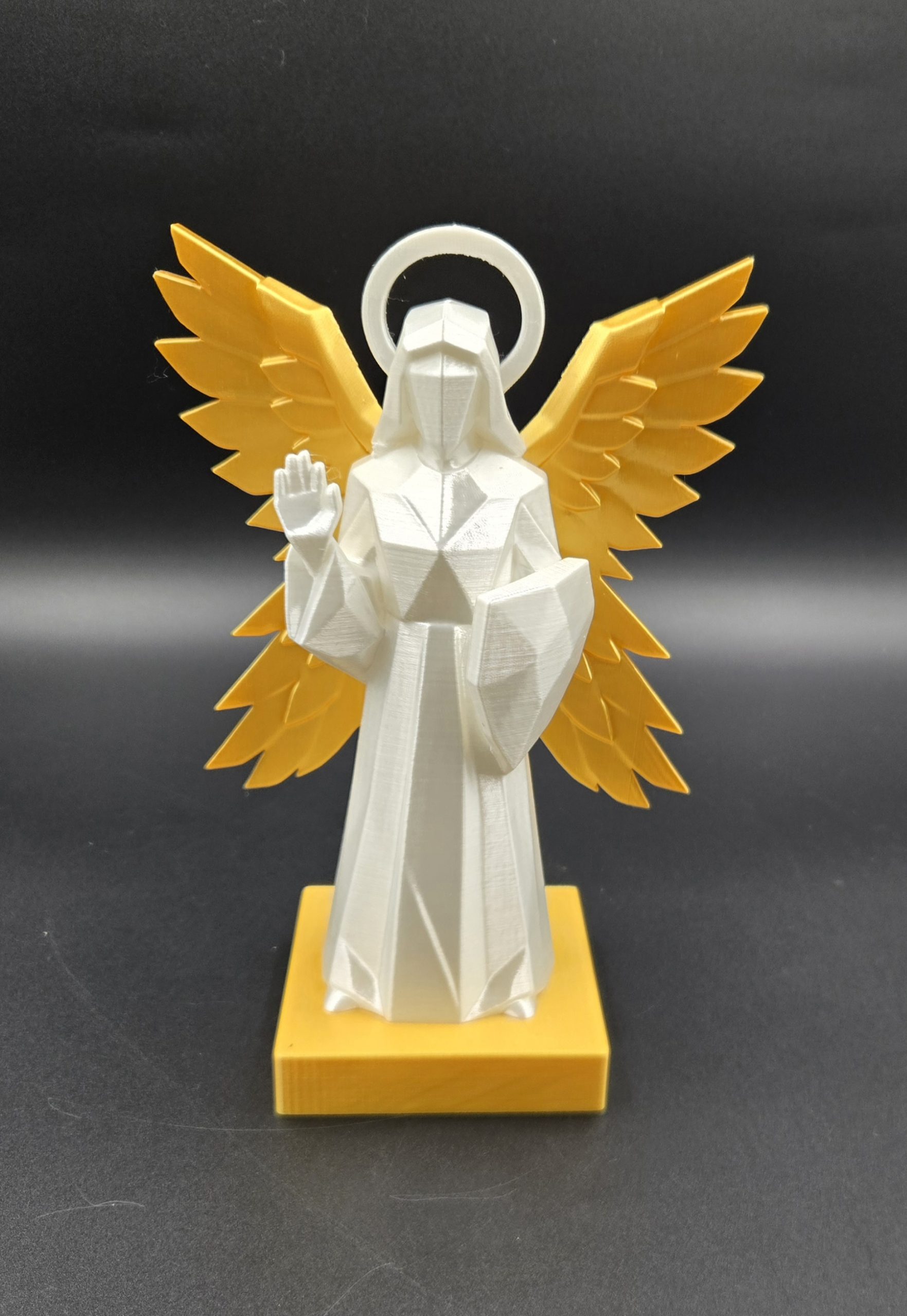 White and Gold Angel Statue